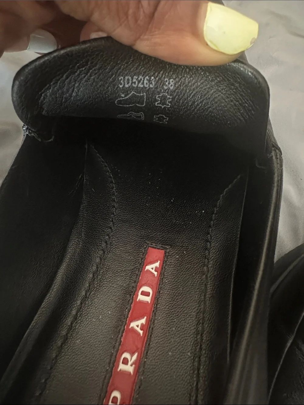 Prada Black Leather Slip-On Loafers with Triangular Logo